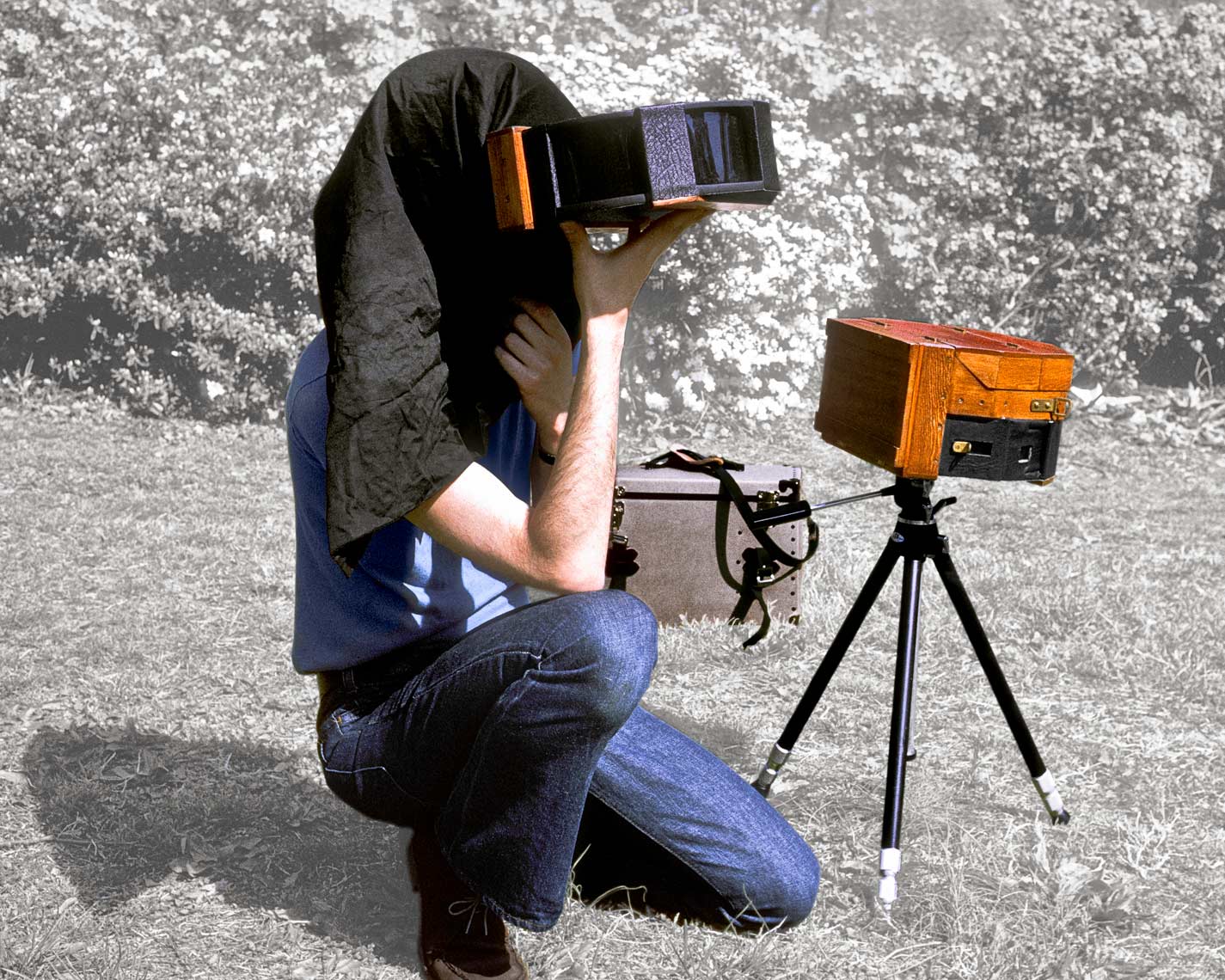 David Lebe using his pinhole viewfinder for 4 apature pinhole camerea, 1974